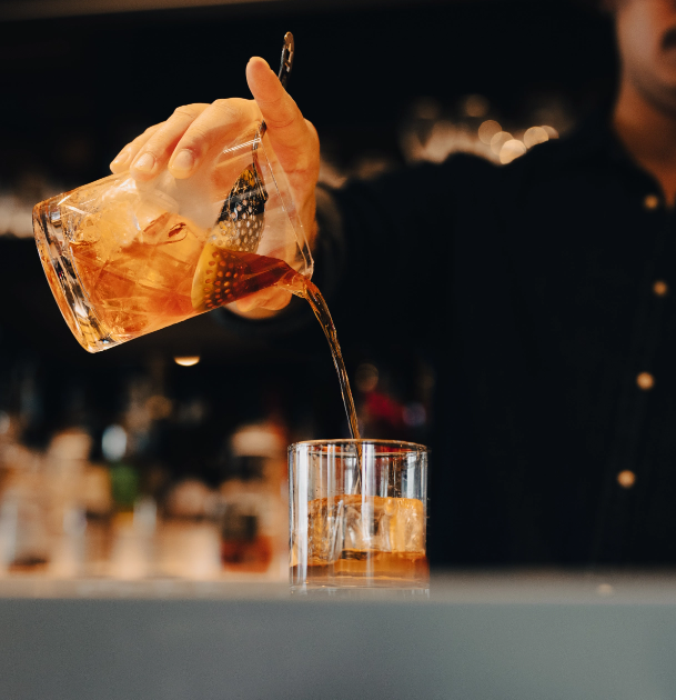 Image of pouring  wie from one glass into another glass