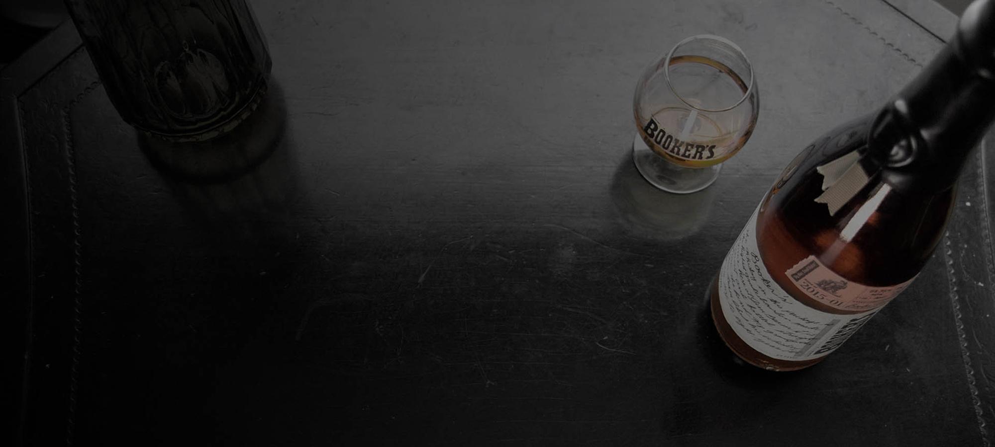 Booker’s bottle and glass background