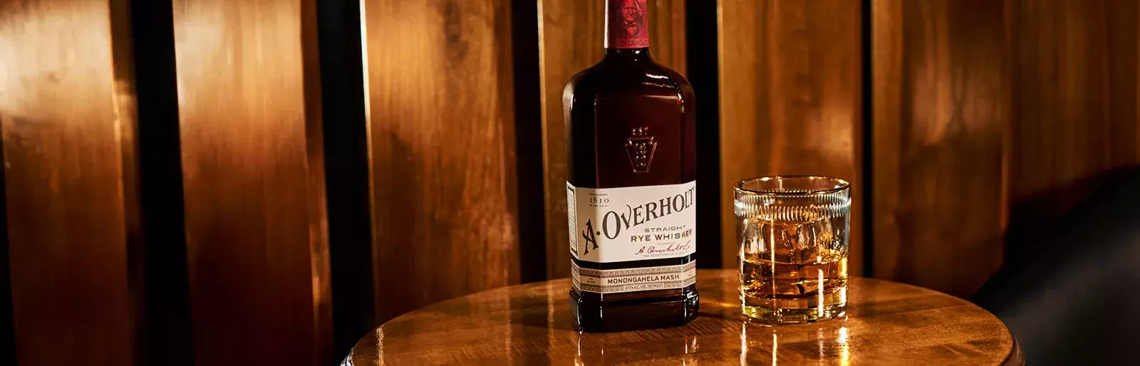 Bottle and drink of American Whisky Old Overholt