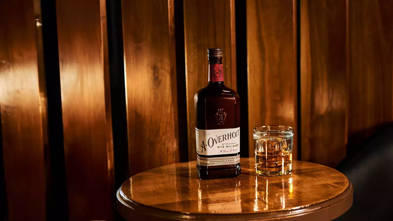 Bottle and drink of American Whisky Old Overholt
