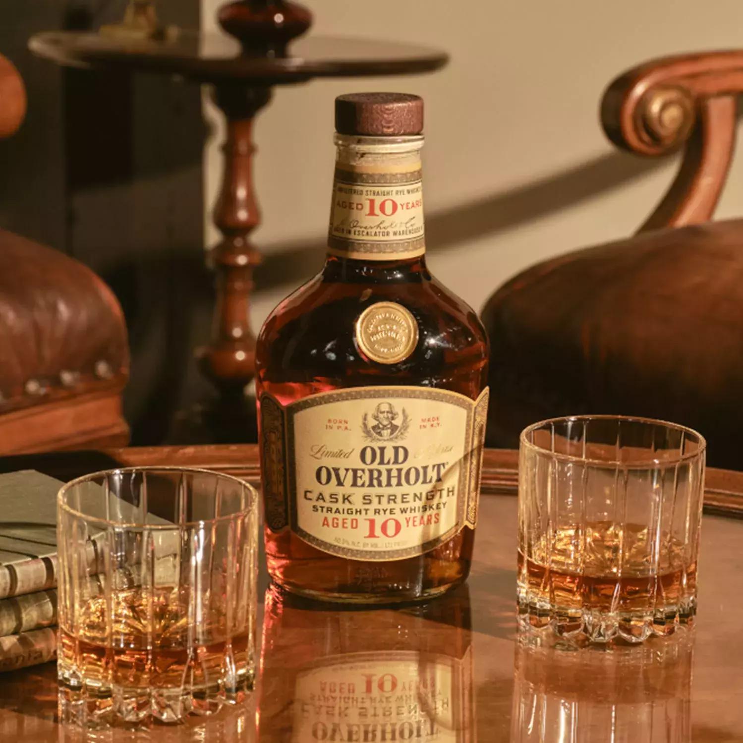 10-Year-Old Cask Strength Straight Rye American Whisky Old Overholt with two glasses.