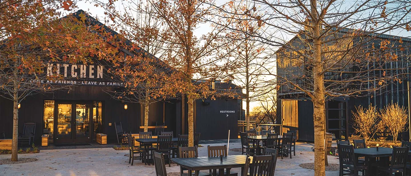 Outdoor dining area of The Kitchen Table restaurant at James B. Beam Distilling Co. in autumn.  SEO