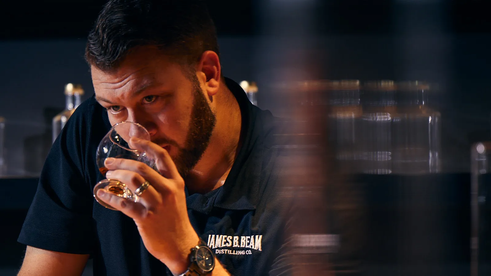 Freddie Noe nosing a glass of bourbon at the James B. Beam Distilling Co. distillery innovation lab