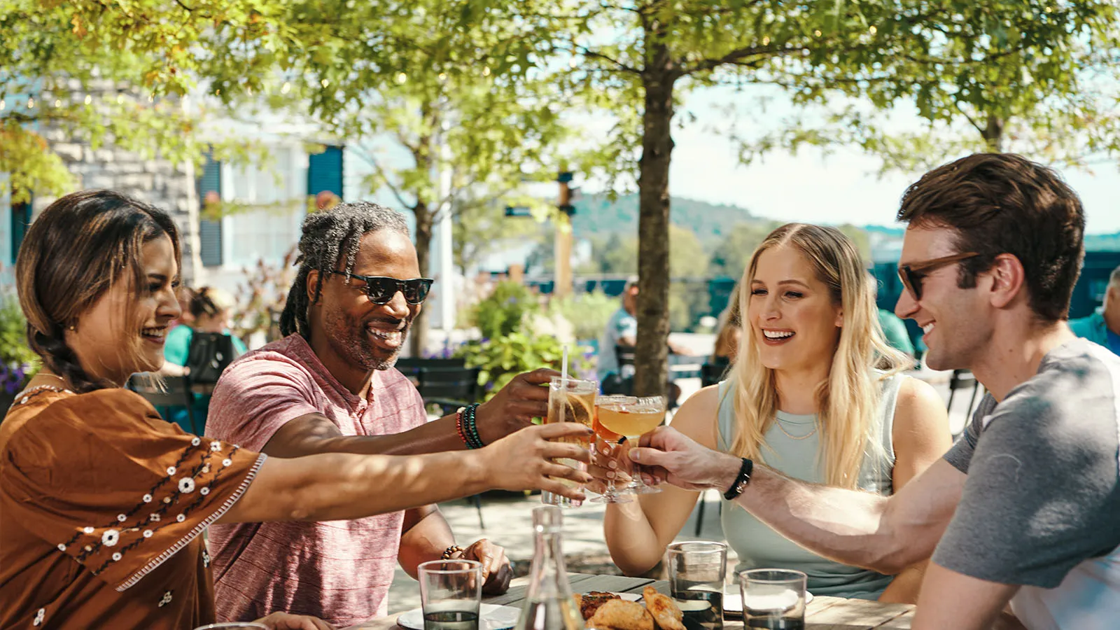 People Cheers Outside Kitchen Table