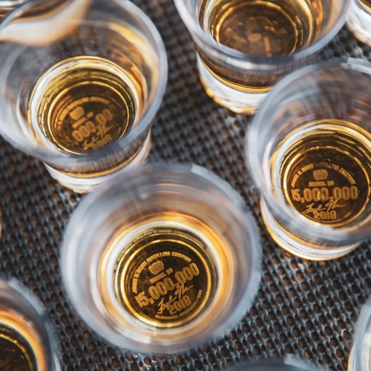 Close-up: Bourbon tasting glasses with 15 Million Barrel commemorative engraving at Jim Beam Distilling Co. 